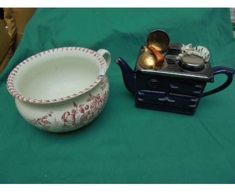 Ceramic toilet bowl with handle and amusing novelty teapot of an AGA with cat 