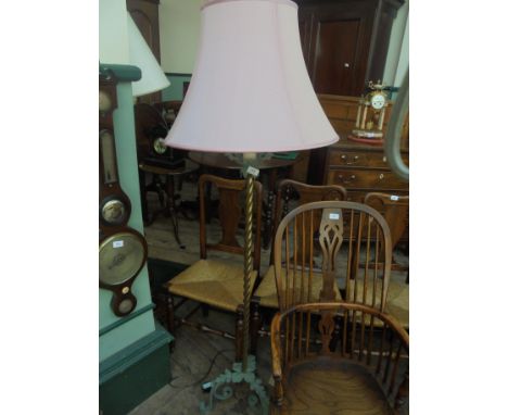 Attractive and unusual twisted brass standard lamp with tripod verdigris feet and candleholder 