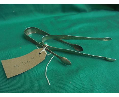 2 pairs of silver sugar tongs, worn