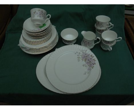 Selection of china cups, saucers, side plates, dessert plates and dinner plates marked Royal Stafford bone china