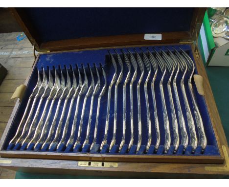 Wooden lidded cutlery box with fitted inner at 2 levels containing 12 large spoons, 12 dessert spoons, 12 large forks, 12 des