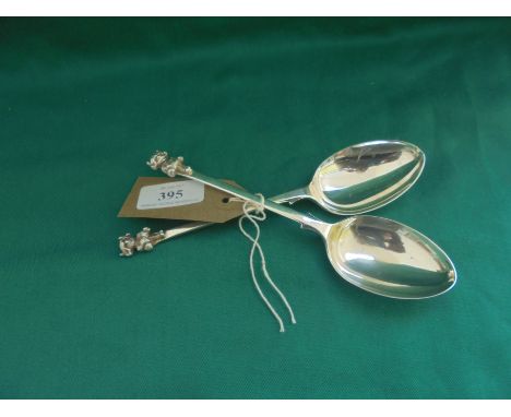 Pair of small silver spoons with mythical figurehead, 3.07oz, Birmingham 1938