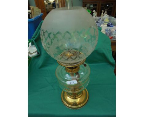 Brass and glass oil table lamp with decorative glass shade, chimney and glass oil container