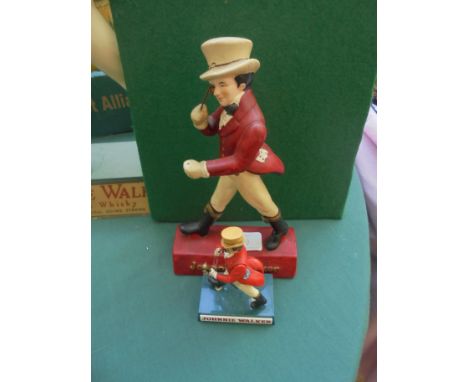2 items, 1 small and the other very small, also for Johnnie Walker Scotch Whisky being logo figure