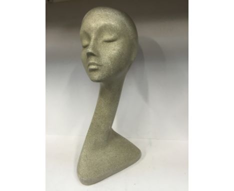 A late 20th century Art Deco style shop display head and shoulders mannequin (51cm). 