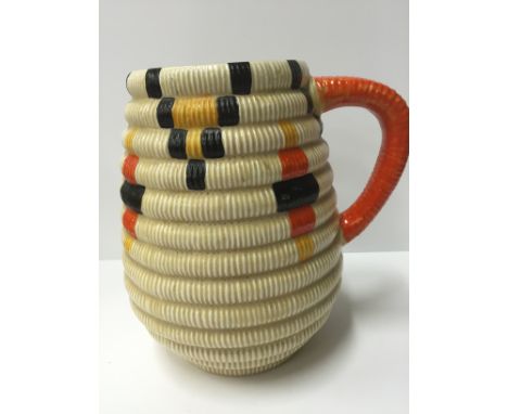 A Clarice Cliff Bizarre Wilkinson Pottery basket-work design single handle jug (21cm).