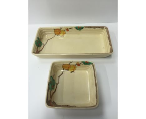 A Clarice Cliff Wilkinson Pottery hors d'oeuvres dish decorated in a lantern and branch pattern together with a matching smal