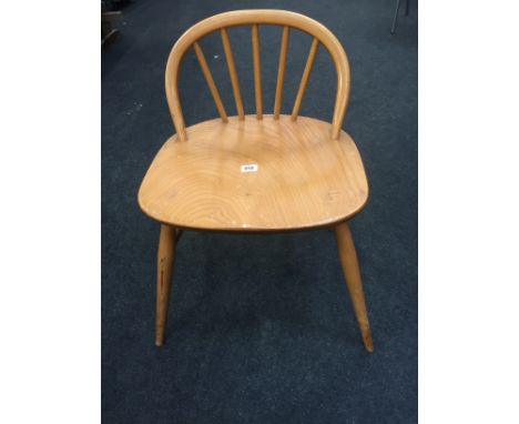 A low Ercol Windsor (414) style low back desk/dressing chair (unmarked).