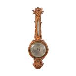AN UNUSUAL VICTORIAN CARVED OAK MERCURY WHEEL BAROMETER