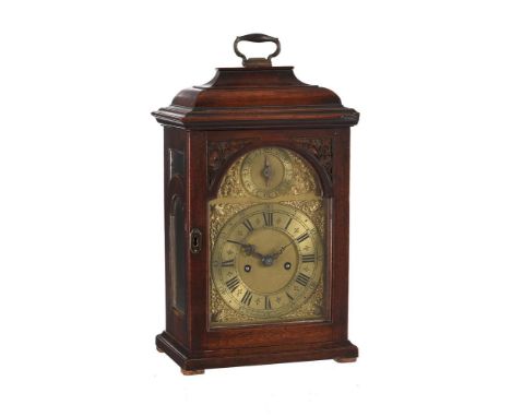 A RARE GEORGE II PROVINCIAL MAHOGANY TABLE CLOCKJONATHAN SMALLWOOD, LICHFIELD, CIRCA 1735The five finned pillar twin fusee be