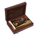 A GOULD-TYPE LACQUERED BRASS PORTABLE COMPOUND MICROSCOPE