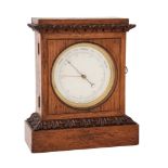 A VICTORIAN BRASS VIDIE-PATTERN ANEROID OAK-CASED MANTEL BAROMETER