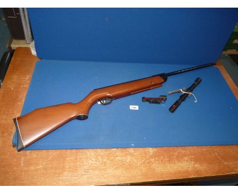 A Webley Vulcan Air Rifle plus three assorted sights.****ALL WEAPONS AND/OR AMMUNITION MUST BE COLLECTED IN PERSON - NO POSTA