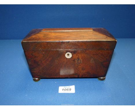 A Mahogany sarcophagus shaped Tea caddy with two compartments and mother of pearl escutcheon, 8 1/4" wide x 5'' high x 4'' de