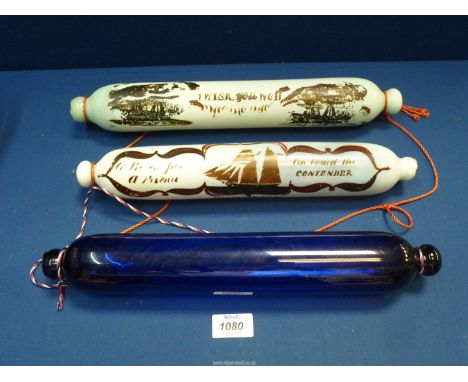 A pair of opaque Glass rolling Pins with painted ships and mottoes and a Bristol blue rolling pin.