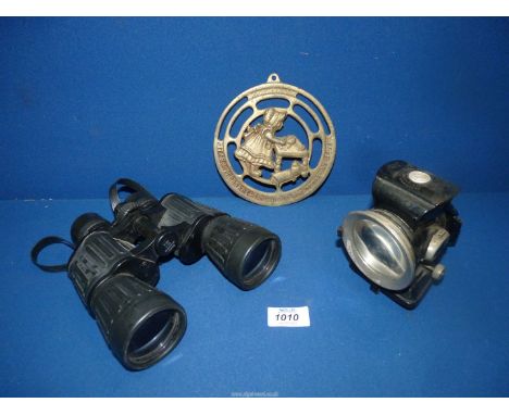 A Lucas "Black Prince" car/bicycle lamp, a pair of Bresser Condor 7 x 50 binoculars and a brass plaque.