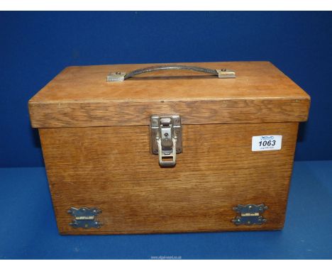 A vintage stage makeup case and contents to include: Leichiner pan stick and powders, Crowe's Cremine brushes, etc.