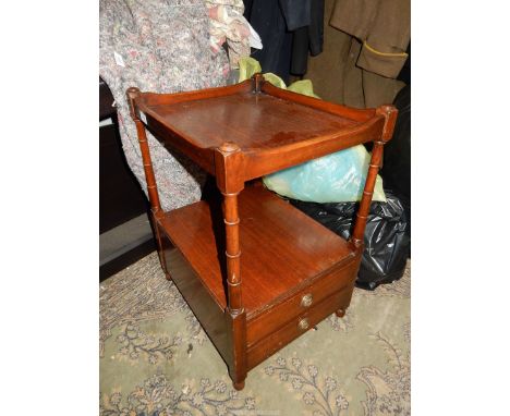 A Mahogany two stage Etagere having turned supports, the lower shelf with two drawers below having drop ring handles, 16" x 1