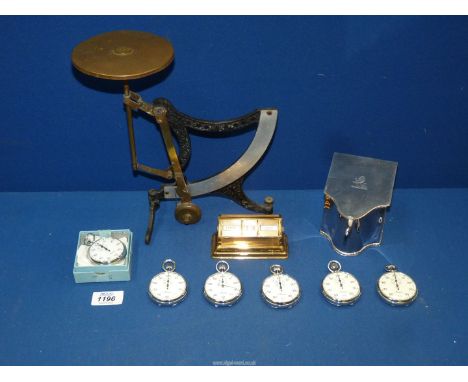 A set of antique Postal scales together with a rotating desk calendar (working), silver plated tea caddy and six Minerva stop