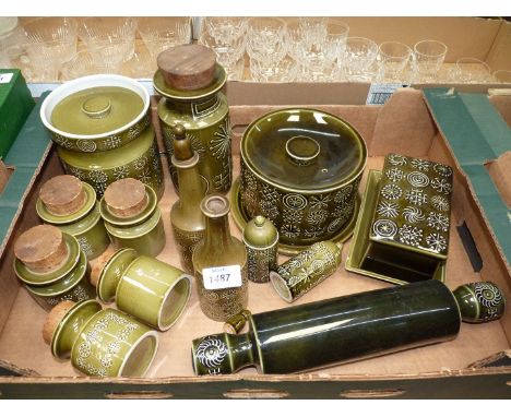 A quantity of green "Portmeirion" Totem china to include: a cheese dome, a butter dish, rolling pin, spice jars, a biscuit ja