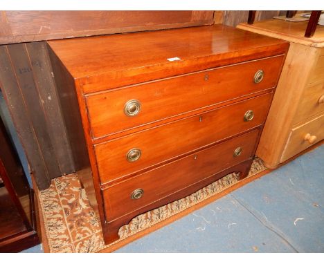 A low Mahogany Chest of three long Drawers with brass drop ring handles, 34 1/2" wide x 16 3/4" deep x 30 3/4" high and stand