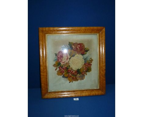 A Burrwood framed wool work and bead work floral spray tapestry 20 1/4" x 21 3/4".
