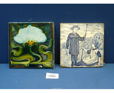 Two Tiles, one a floral Art Nouveau tile, 6" square, the other a blue and white Delft tile of a girl and boy helping with the