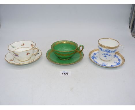 Three cabinet cups and saucers a Royal Worcester blue and ivy cup and saucer, T. Goode & Co Westwood green oak cup and saucer