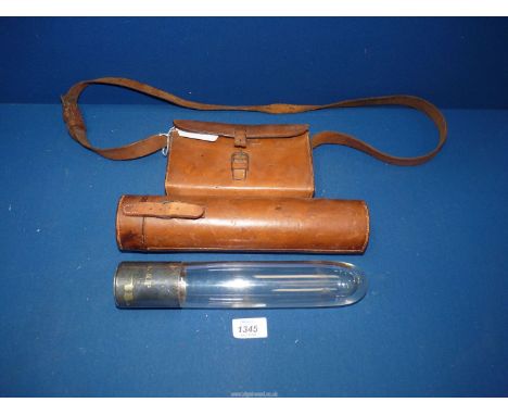A silver plated Sandwich Box, maker Swaine & Adeney, London and a silver plated and glass Flask, both in leather cases.