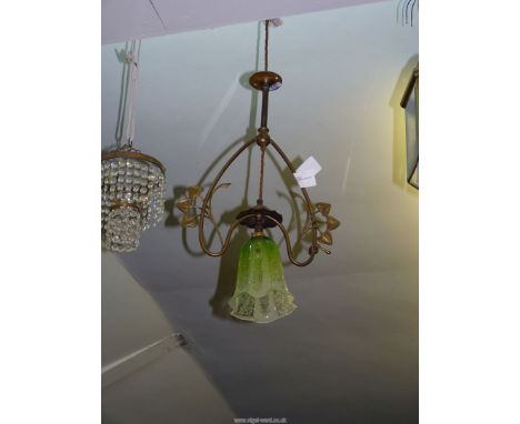 A brass Art Nouveau ceiling light with green shade, 20'' tall.