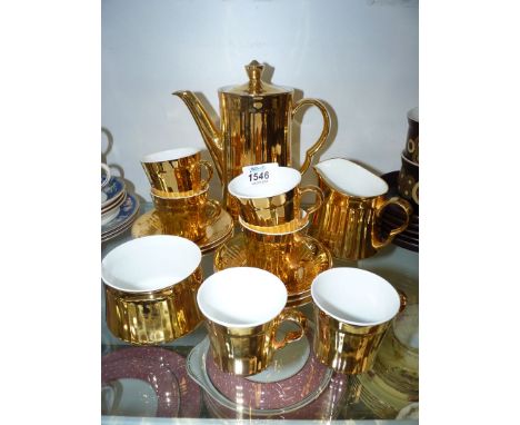A Royal Worcester gold lustre coffee service for six.