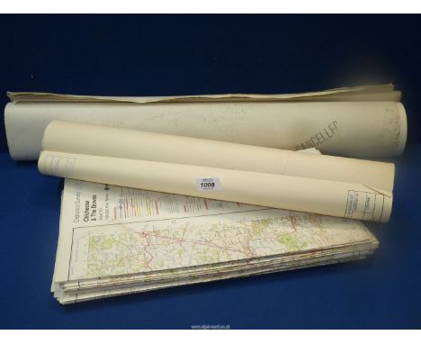 A quantity of Ordnance Survey maps, a roll of Maritime Navigation charts and a roll of plans and calculations from Cambridge 