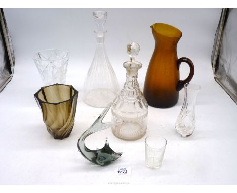 A small quantity of glass to include: an etched triple ring decanter, glass fish paperweight, vases, etc.