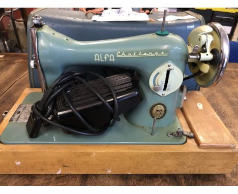 Vintage Alfa Challenge electric sewing machine with leather top case, untested, buyer collects.