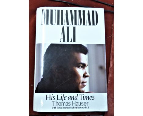 Muhammad Ali - His life and Times by Thomas Hauser, Hardback with dust cover, first edition signed by the author. Some slight