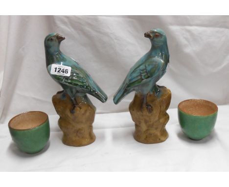 A pair of antique Chinese pottery bird figurines with coloured glazes - sold with a pair of Chinese crackle glaze cups - vari
