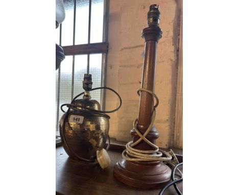 A hammered brass table lamp - sold with a wooden candlestick style lamp base