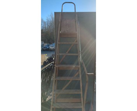 A wooden stepladder (sold as a collector's item only) - sold with a vintage scythe