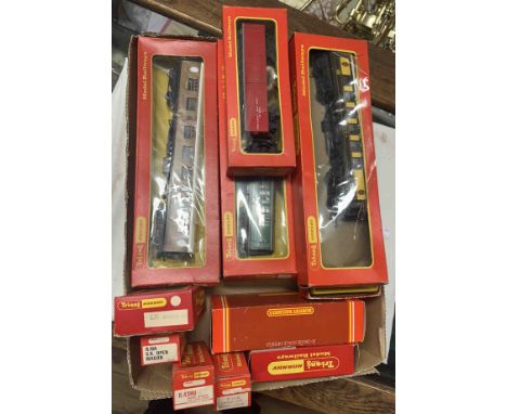 A box containing assorted boxed Hornby rail carriages and wagons and a R.850 Flying Scotsman loco and tender