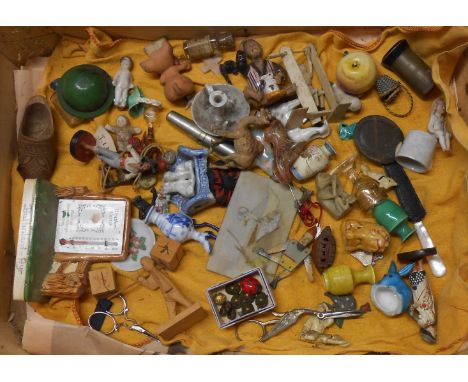 A box containing a quantity of miniature ceramic, glass and collectable items including 'Snow Baby' Christmas cake decoration