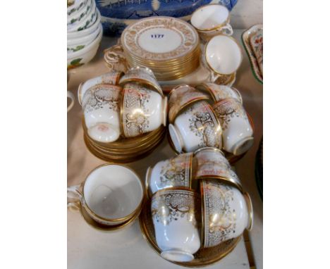 A quantity of Royal Worcester teaware with gilt decoration including cups and saucers, plates, etc.