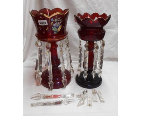 A 19th Century ruby glass table lustre with enamel decoration and faceted drops - sold with another similar - various conditi