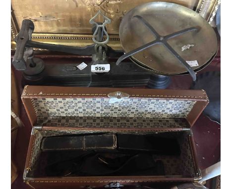 An antique set of shop scales - sold with a small case containing a Scout's belt, cutthroat razor, etc.