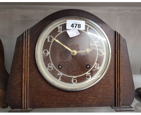 A vintage oak cased mantel clock with Garrard eight day gong striking movement