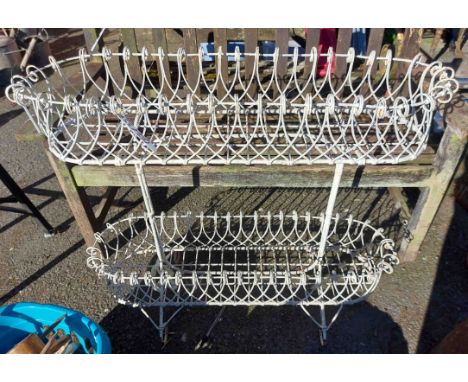 A Victorian wirework oval two tier garden planter