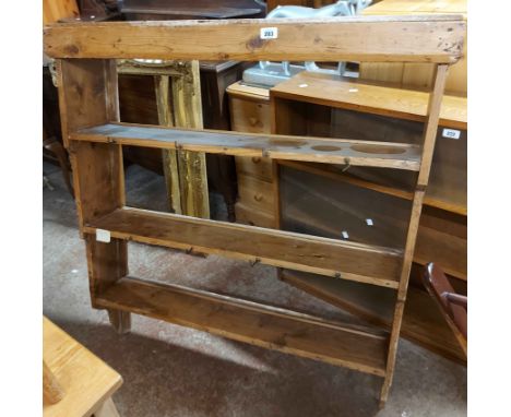 A 100cm old pine wall hanging three shelf open plate rack with iron cup hooks