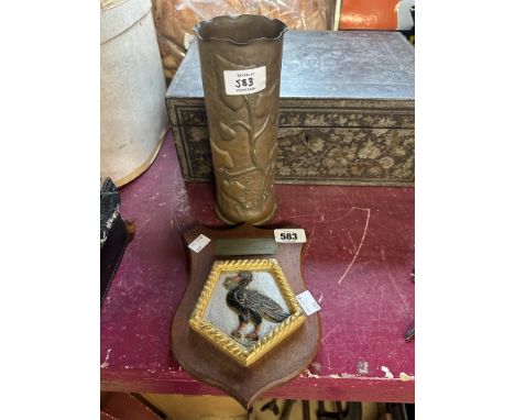 A vintage ship's plaque for H.M.S Liverpool - sold with a decorative brass ammunition shell vase embossed with ivy leaves