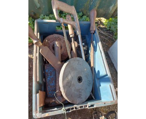 A crate containing a quantity of assorted tools