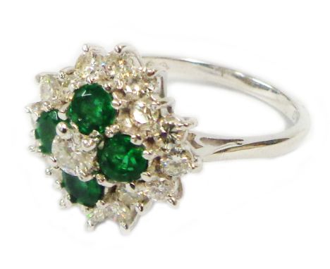 An 18ct. white gold emerald and diamond cluster ring - size O 1/2 - boxed