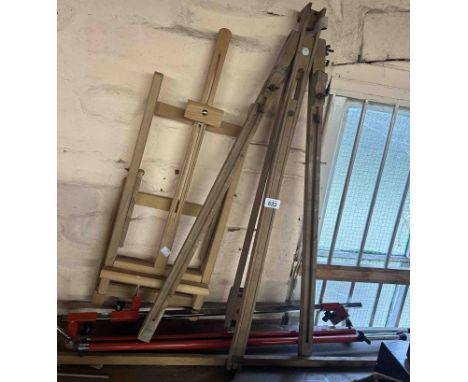 A vintage Winsor &amp; Newton wooden artist's easel - sold with a red metal easel and one other